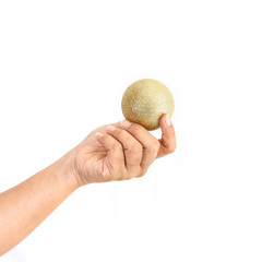 Close up hand holding Christmas ball isolated on white background