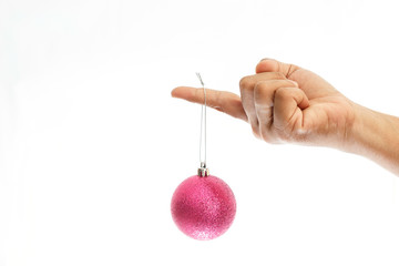 Close up hand holding Christmas ball isolated on white background