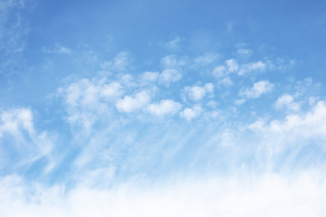 Fantastic soft white clouds against blue sky background.