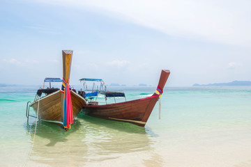 Naklejka na ściany i meble Traditional thai longtail boat for tourists
