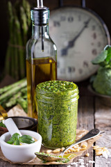 Jar with homemade pesto sauce 