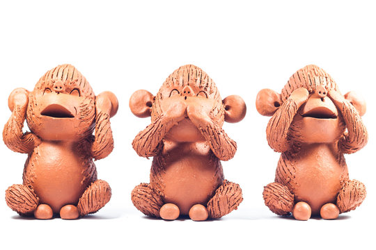 Close-up monkey clay dolls isolated on white background