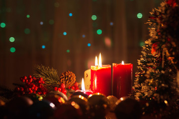 Burning candles in the Christmas night atmosphere