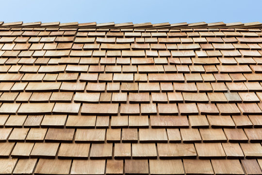 Wooded plank roof tiles
