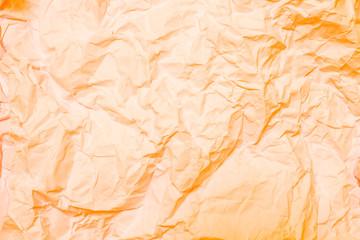 Orange crumpled paper, wrinkled paper