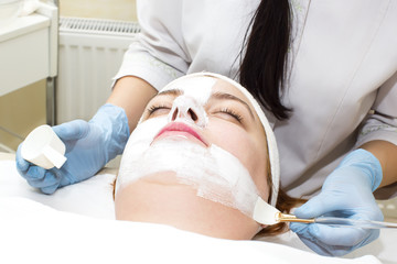 Obraz na płótnie Canvas Cosmetic treatment with injection in a clinic