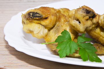 fried chicken wings on wood
