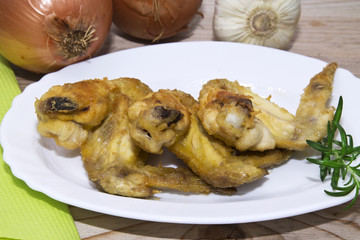 fried chicken wings on wood
