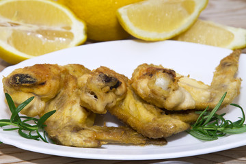 fried chicken wings on wood