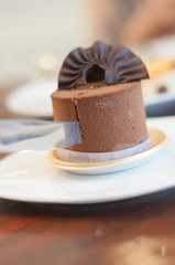 eating of chocolate cake in coffee shop