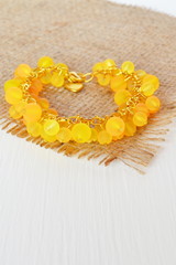 Yellow bracelet with beads
