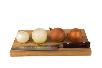 Fresh sliced onions on a board on a white background
