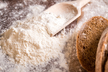 At the bakery, using flour for baking