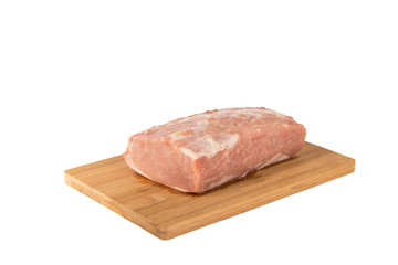 Raw piece of meat on a wooden board on a white background