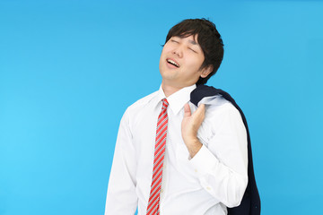 疲れた表情のビジネスマン