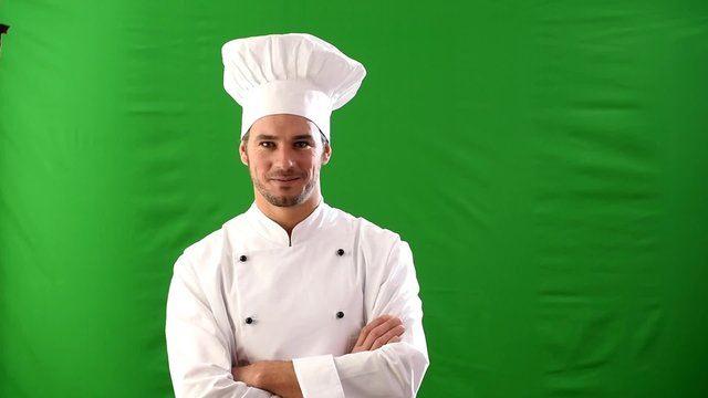 on a green background, a cook chef in uniform, with a hat