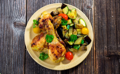 Roasted chicken legs with vegetable