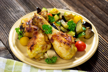Roasted chicken legs with vegetable