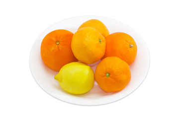 Different citrus on a white dish