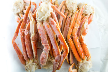 frozen crab claw in a box for sale on the market