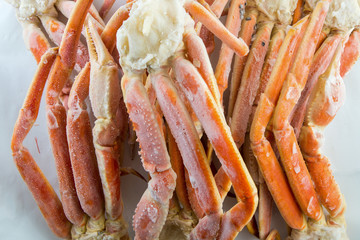 frozen crab claw in a box for sale on the market © suvorovalex