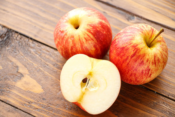 Apple on wooden table.