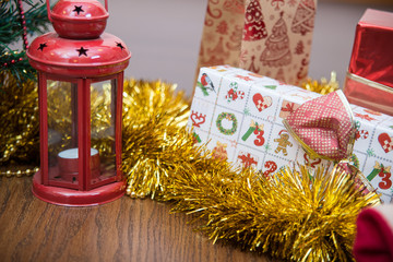 Christmas celebration things: firtree with gifts under it, decor