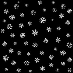 Falling snow or night sky with stars vector seamless pattern. Black and white hand drawn spray or splash monochrome texture. White spots on chalkboard background. Abstract backdrop.
