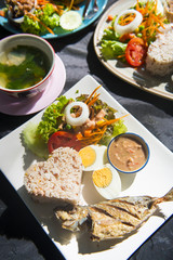 rice with fried mackerel and shrimp paste sauce served with sala