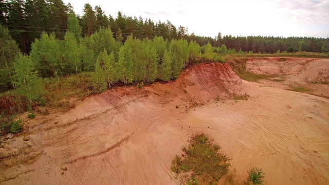 A aerial bald river banks in Piusa because of sand quarrying. A quarry is a place from which dimension stone rock construction aggregate riprap sand gravel  