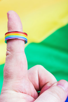 Ring rainbow gay on his finger