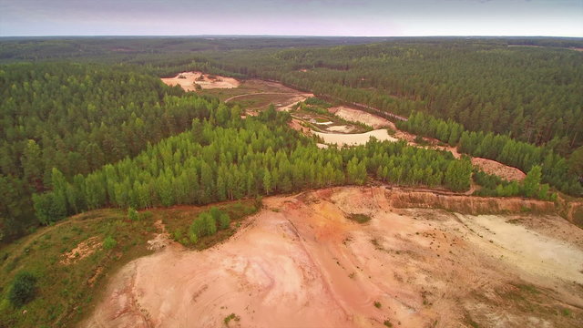 The aerial shot of the quarry area in Piusa. There are some areas where quarries are done but most of the forest are reserved
