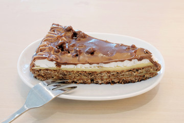 Piece of almond chocolate cake