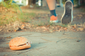 Hamburger and jogging , process in vintage style