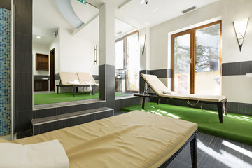 Sunbeds in hotel spa center