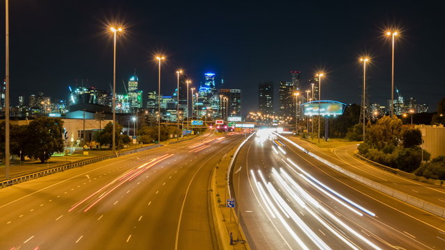 4k hyperlapse video of highway traffic and cityscape