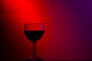Fototapeta na wymiar Studio still-life with a glass of wine