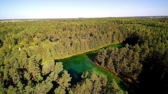 Aerial shot of the Antu lake in the middle of the forest in Laane-Virumaa in Estonia