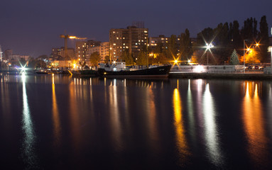 Night City Lights / The lights of night city of Kaliningrad of the Russian Federation, ships, boats on the river.