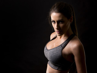 fitness woman on black background