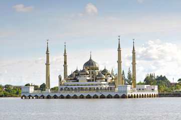 Beautiful crystal mosque with blue sky and clouds at Terengganu,