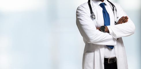 Doctor in front of a bright background