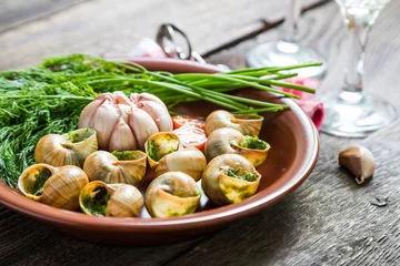 Papier Peint photo autocollant Plats de repas Escargot. The snails in garlic butter and herbs