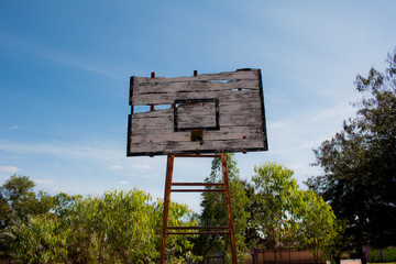 Basketball hoop is broken and wood board damaged ,Shiny wooden basketball