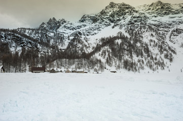 Fototapeta na wymiar Snowcapped Village, Italy, Alps, Piemonte, Alpe Devero