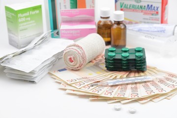 medicaments and euro isolated on white background