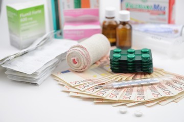 medicaments and euro isolated on white background