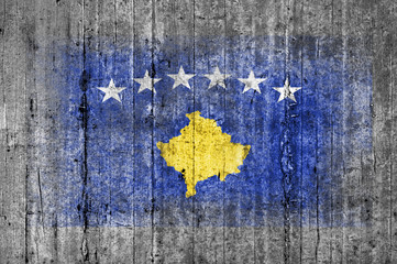 Kosovo flag painted on background texture gray concrete