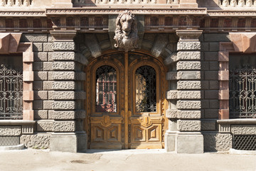 Ornamented wood ancient door. Old decoration of metal of the door photo.