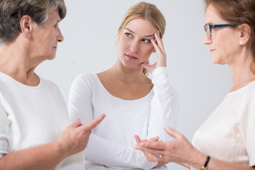 Girl listening counsels from mother